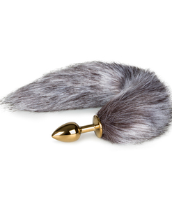 Kleine goudkleurige buttplug met bruin/witte vossenstaart